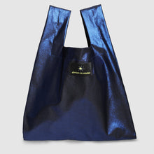 Blue metallic bag with a brand logo on a light gray background

