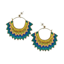 Pair of colorful hoop earrings on a light gray background